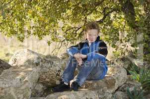 Youngster resting in nature