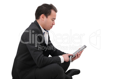 businessman with digital pad touch screen sitting in yoga lotus businessman with digital pad touch screen sitting in yoga lotus
