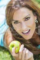 Smiling Woman Eating Apple With Perfect Teeth