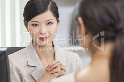 Asian Chinese Woman or Businesswoman in Meeting