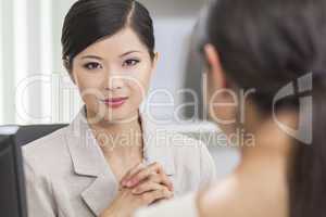 Asian Chinese Woman or Businesswoman in Meeting