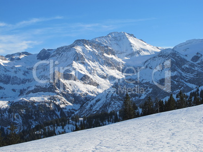 Snow Covered Mountain In The Saanenland