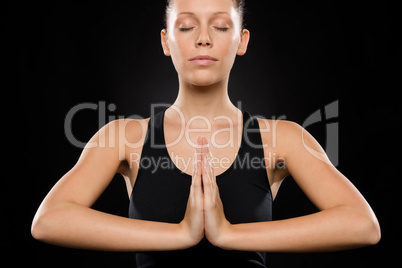 Portrait of young Caucasian woman exercising yoga