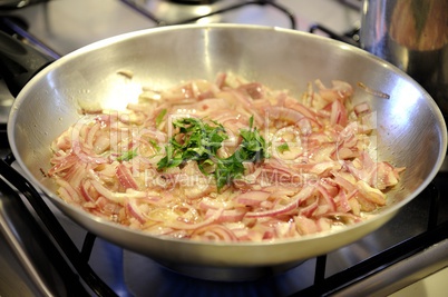 Onion fried in a pan