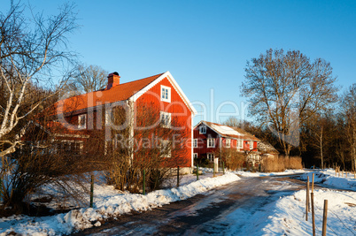 Traditional Swedish houses in winter snow