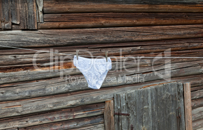 Women's panties drying on the rope