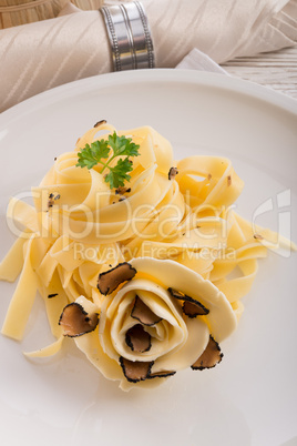 tagliatelle with summer truffle .