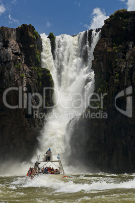 Dinghy under the  the Iguazu Falls