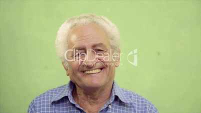 Sequence of portraits, three happy old men smiling at camera