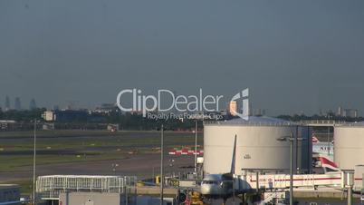 British Airway Airplanes land during rush hour in Heathrow, London, England