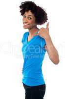 Attractive young model gesturing a mock call