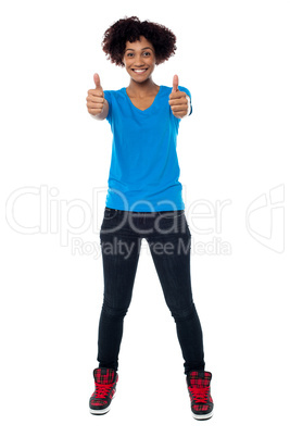 Beautiful trendy woman showing double thumbs up