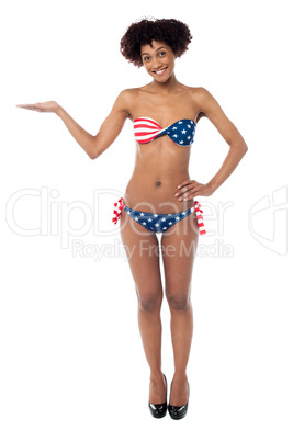 USA flag bikini model presenting copy space