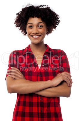Young woman in casuals, arms crossed