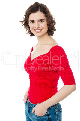 Beautiful female model with hands in jeans pocket