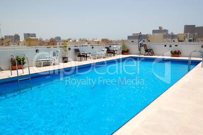 Swimming pool on the top of skyscraper, Dubai, UAE