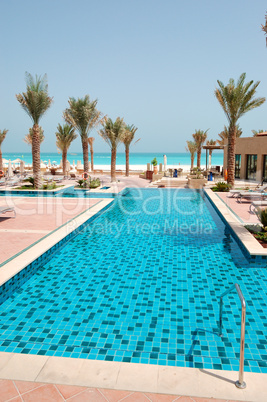 Swimming pool at the beach of luxury hotel, Saadiyat island, Abu