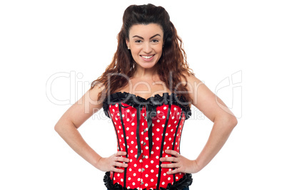 Stylish woman in corset top striking a pose