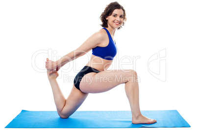 Fit woman doing bent knees exercise