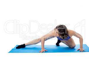 Fit female model in crouching posture