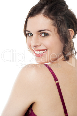 Flirtatious hot model passing smile to you