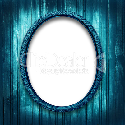 frame for a picture at the grunge a wooden background