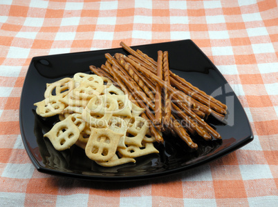 Crackers and salty sticks to beer