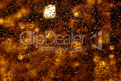 Drops of rain on the glass.