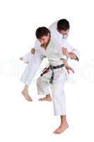 Karate. Men in a kimono with a white background.