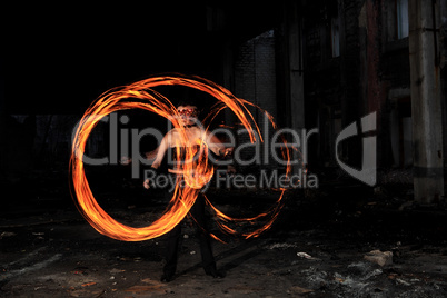 Woman holds in his hand the fire