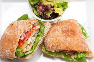 ciabatta panini sandwich with chicken and tomato