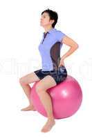 Woman with gym ball doing exercises