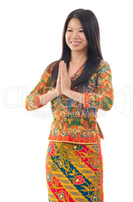 Southeast Asian woman greeting