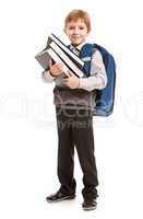 Schoolboy with backpack holding books