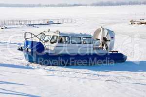 Hovercraft crossing frozen river Volga in Samara, Russia