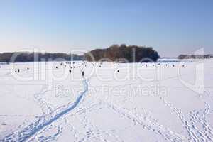 Winter fishing on frozen reservoir