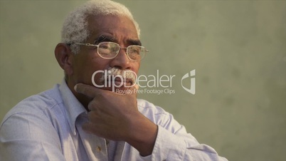 Portrait of serious african american old man looking away