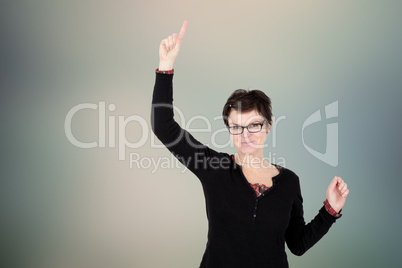 Woman stretched index finger in the air and looking forward