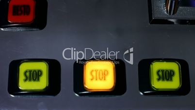 Slot machine videopoker stop button