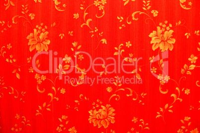 red abstract background with golden flowers