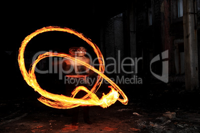 Woman holds in his hand the fire