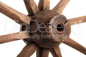 Old wooden wheel on the white background