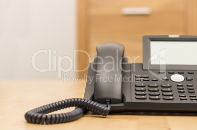 phone on desk with blurred background