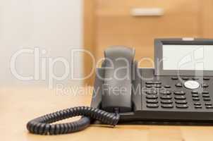 phone on desk with blurred background