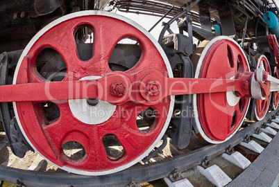 Old steam locomotive wheel and rods details