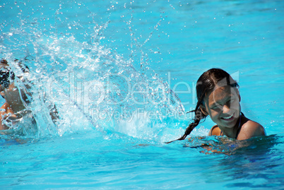 Kids having fun in swimming pool