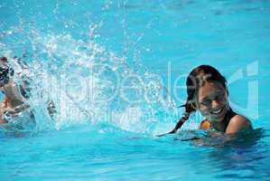 Kids having fun in swimming pool