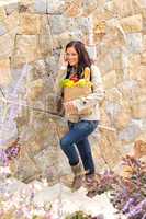 Woman walking stairs calling mobile phone happy