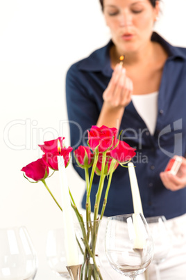 Woman setting table romantic dinner roses Valentine's