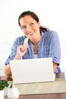 Smiling woman shopping internet home finances banking